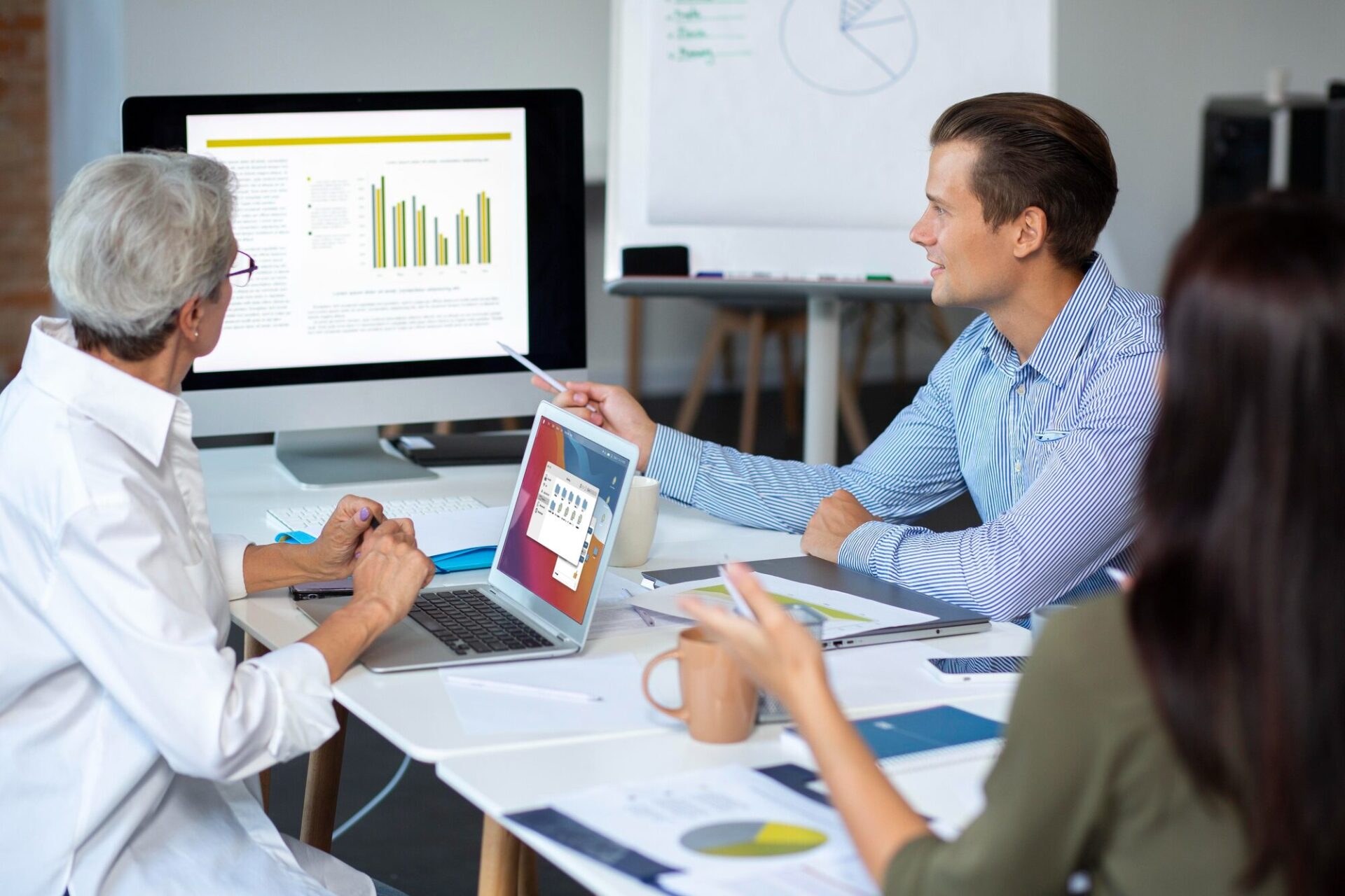 Team analyzing real-time ERP business data